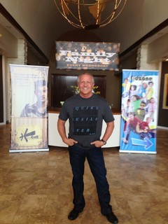 Jim standing inside an event venue