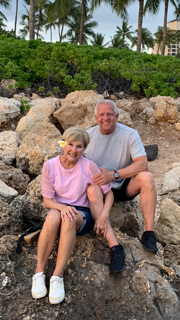 Jim and Sheree sitting together outdoors