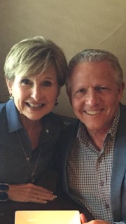Jim and Sheree smiling together outdoors