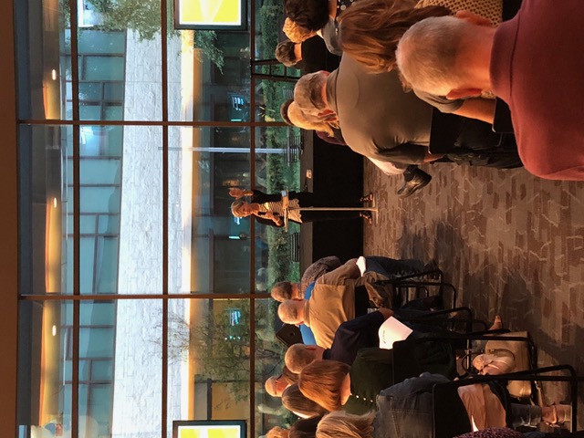 Jim speaking to a seated audience