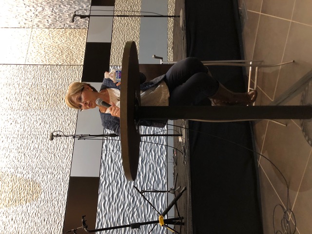 Sheree speaking from a lectern