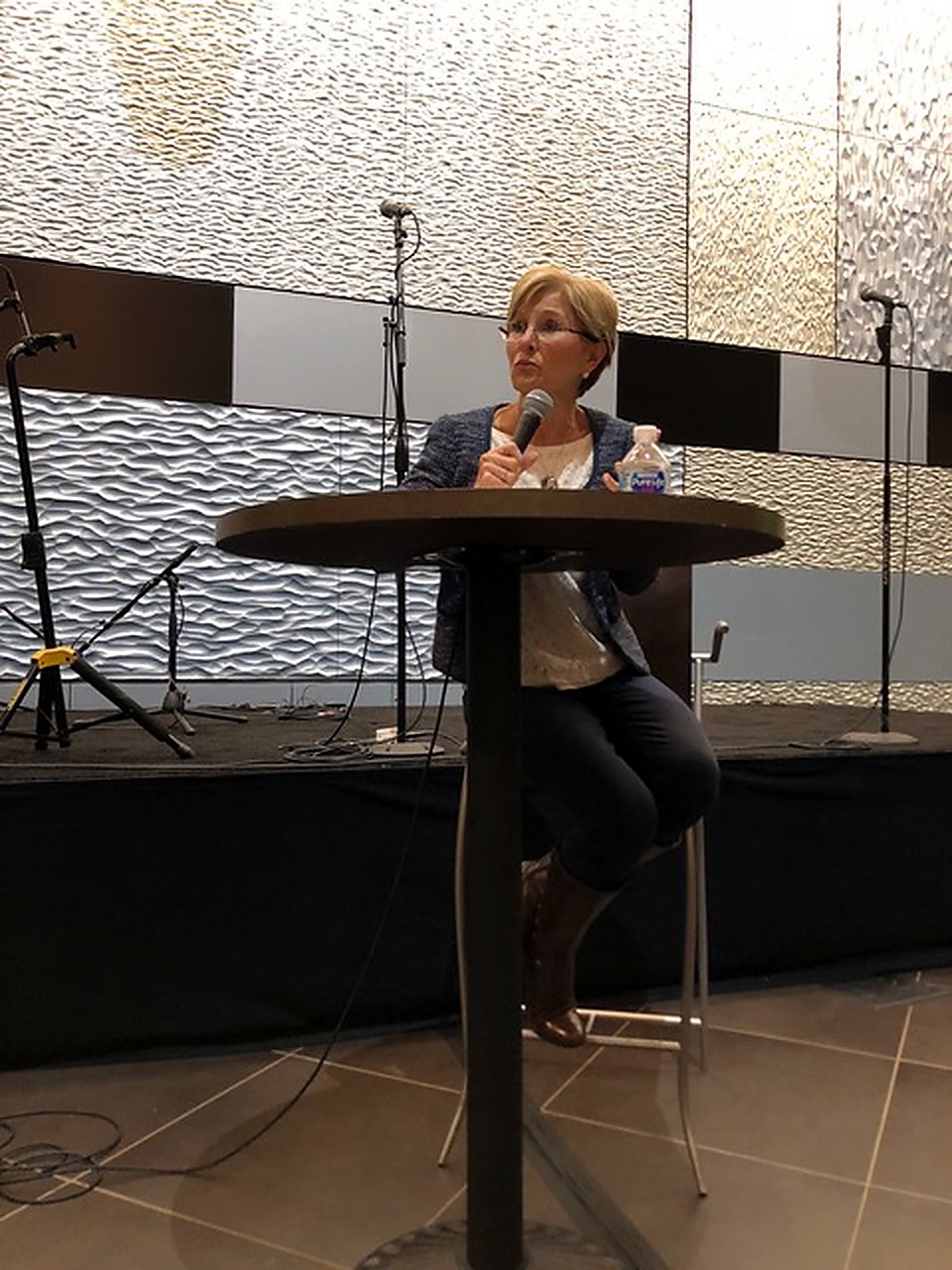 Sheree speaking from a lectern